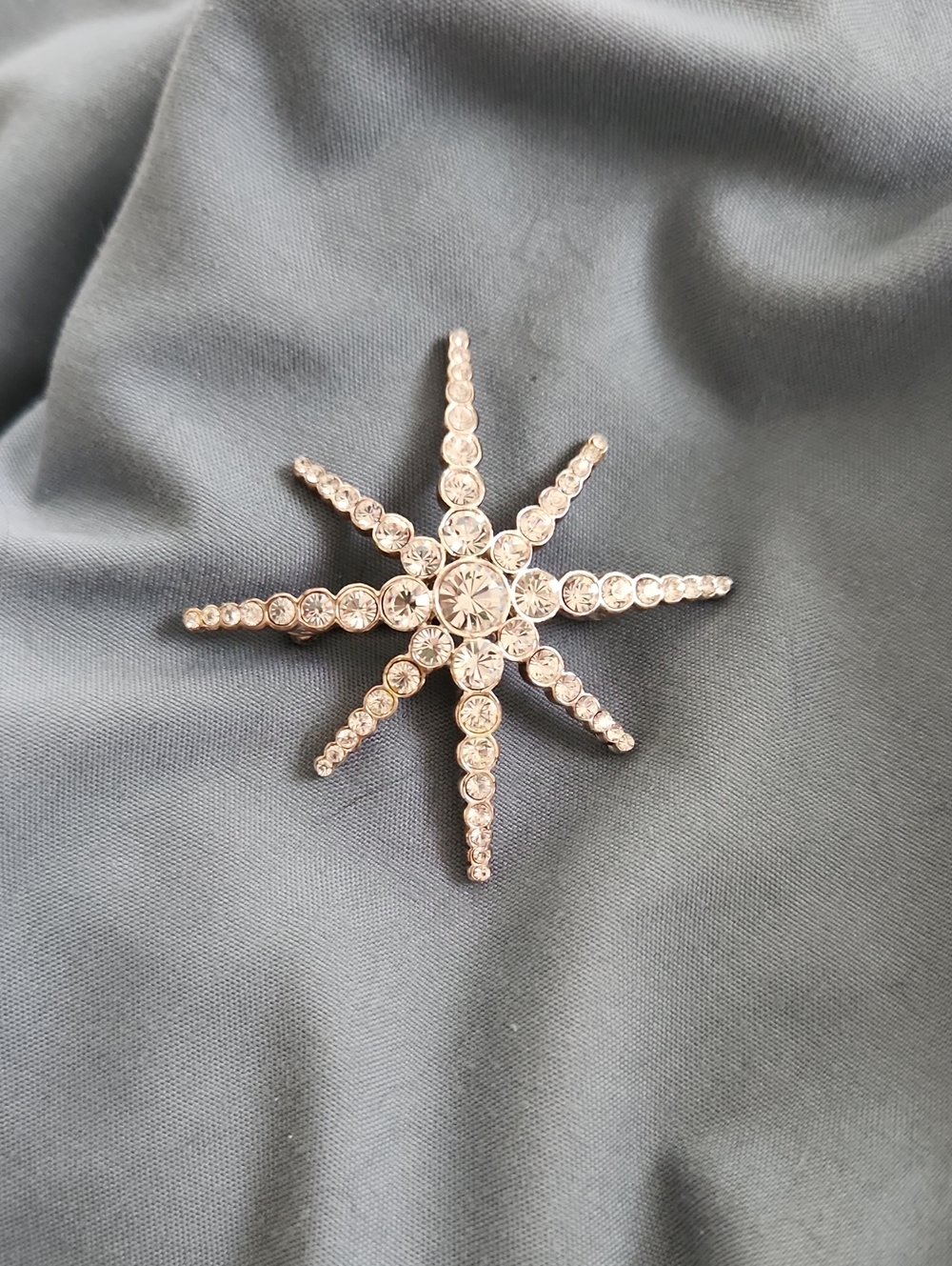 Monet Crystal Starburst Brooch - Silver Tone